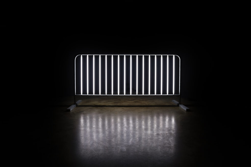 Antonia Wright and Ruben Millares, Where there is power, there is resistance, 2021, Steel barricade and fluorescent lights, 80″ x 43″ x 28″