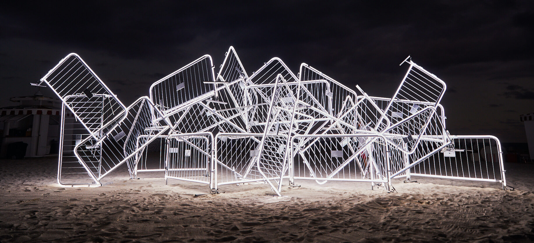 A commission by No Vacancy: Antonia Wright in collaboration with Ruben Millares, 2022, 25 steel barricades, LED lights, steel zip ties, 40 x 10 x 10 ft, Installation image from the Faena Hotel Miami Beach